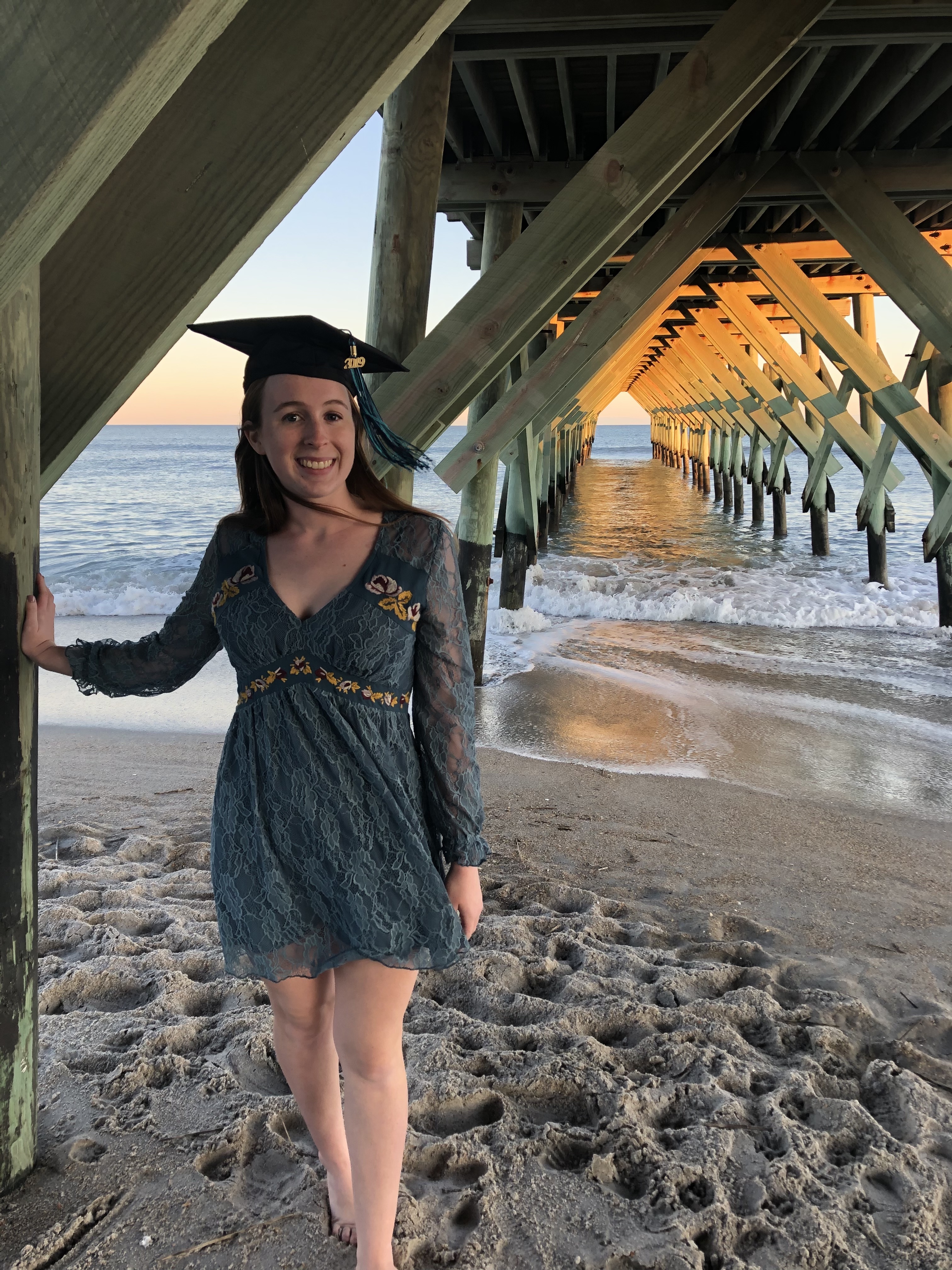 UNC Wilmington graduate, taking picture at the beach